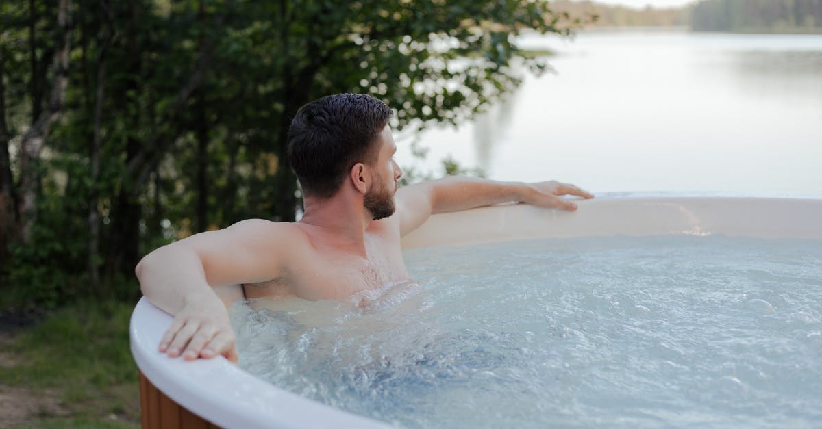 Packaged mozzarella wet - Man in White Bathtub Packaged mozzarella wet - Man in White Bathtub