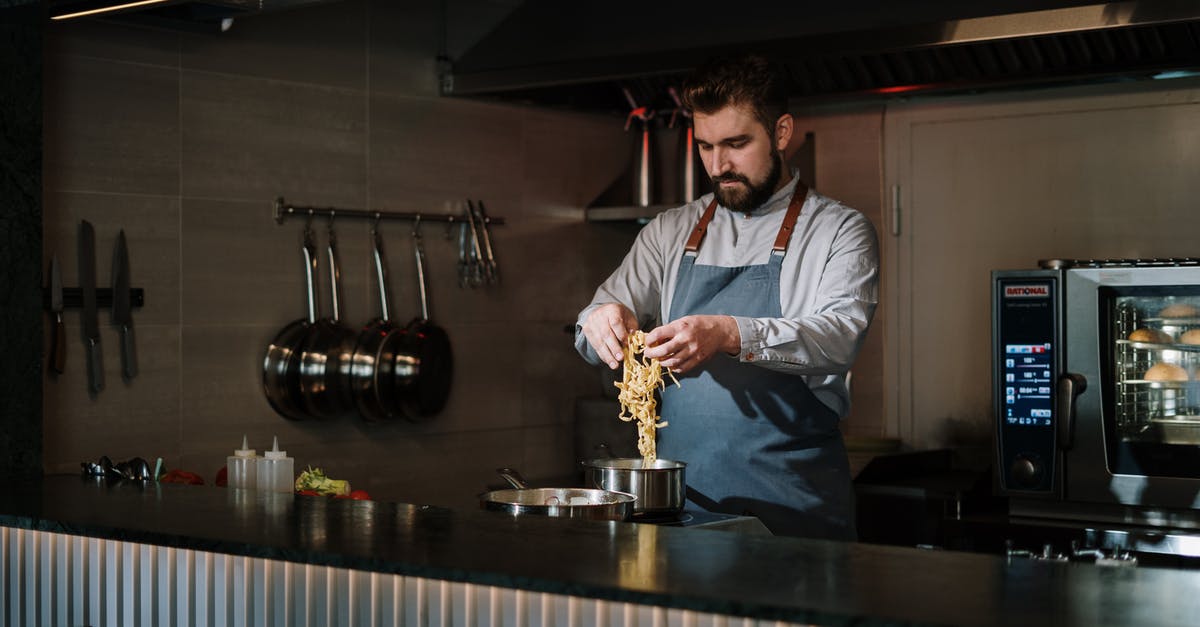 Pan vs oven cooking - Man in White Dress Shirt Pouring Water on Stainless Steel Cup Pan vs oven cooking - Man in White Dress Shirt Pouring Water on Stainless Steel Cup