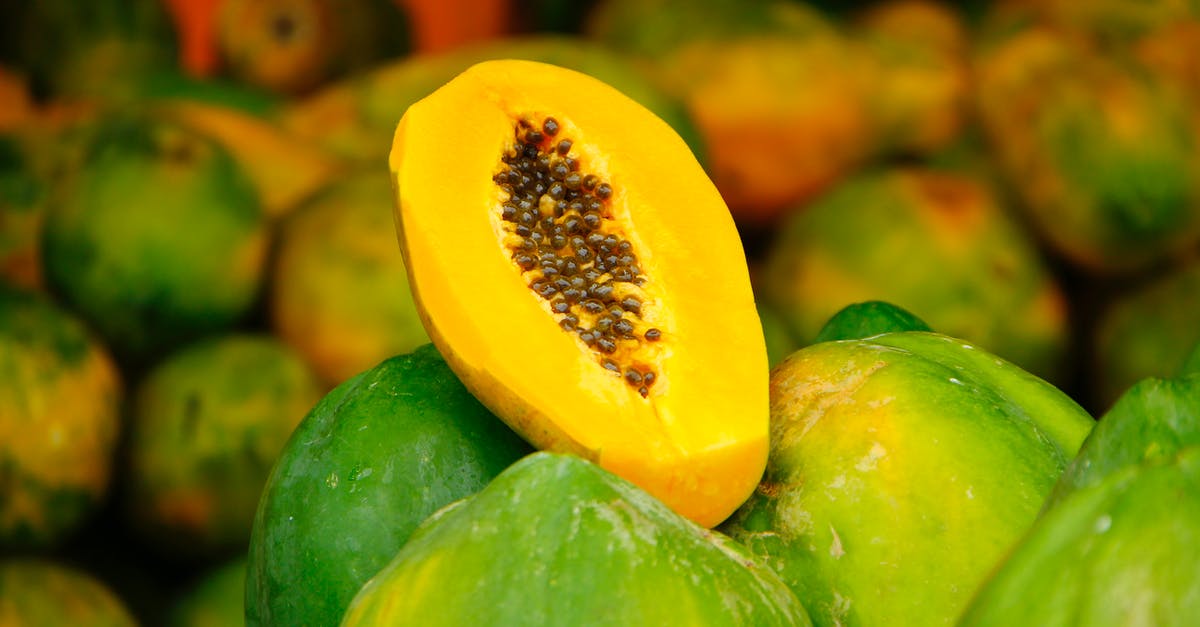 Papaya puree types - Yellow and Green Fruits in Tilt Shift Lens Papaya puree types - Yellow and Green Fruits in Tilt Shift Lens