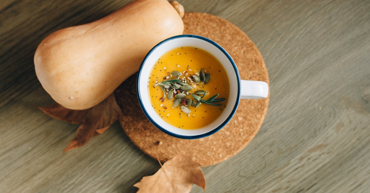 Papaya puree types - Soup in White Ceramic Bowl Papaya puree types - Soup in White Ceramic Bowl