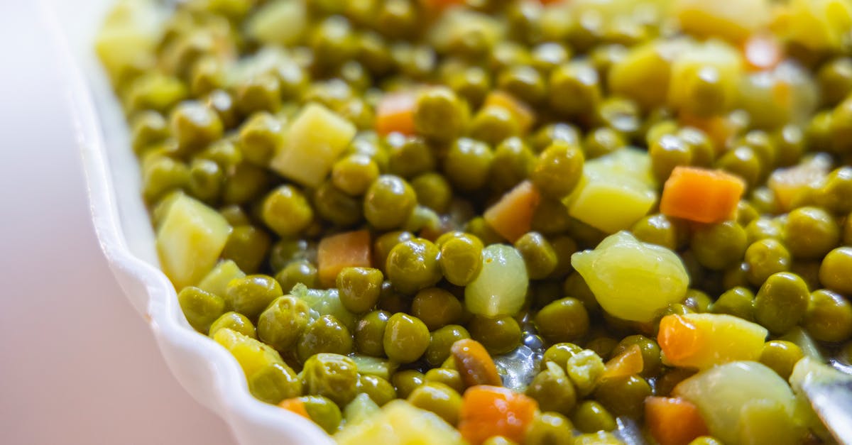 Parcooking carrots and green beans for an already well-seasoned casserole - Green and Yellow Beans on White Ceramic Bowl Parcooking carrots and green beans for an already well-seasoned casserole - Green and Yellow Beans on White Ceramic Bowl