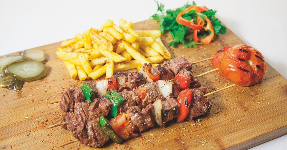 Pastry not "sticking" to beef Wellington - Brown Chopping Board With Barbeque Pastry not "sticking" to beef Wellington - Brown Chopping Board With Barbeque