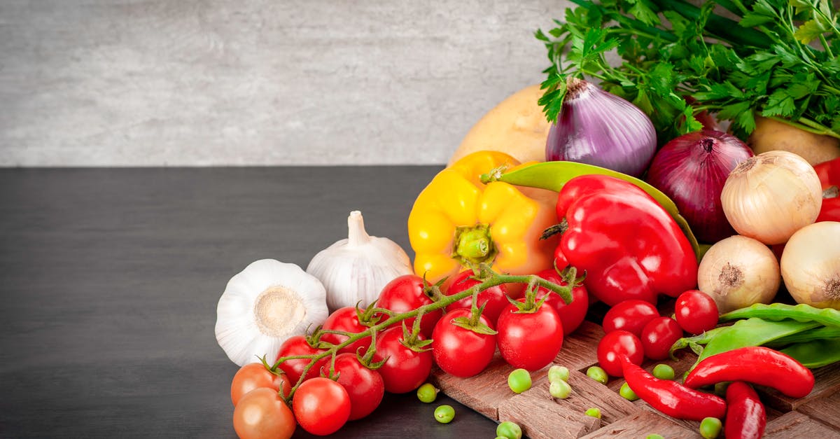 Peas with onions - Fresh Vegetables over a Table Peas with onions - Fresh Vegetables over a Table