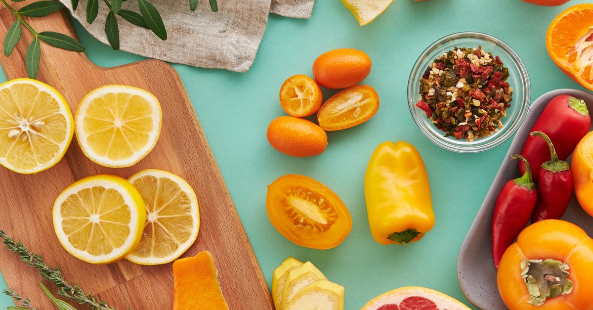 Peeling tomatoes - Sliced Orange Fruit Beside Sliced Orange Fruit Peeling tomatoes - Sliced Orange Fruit Beside Sliced Orange Fruit