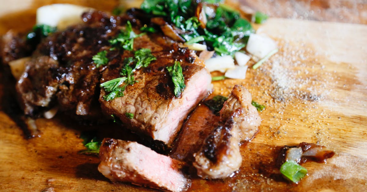 Peking Duck Sauce - Grilled Meat With Parsley Toppings on Top Peking Duck Sauce - Grilled Meat With Parsley Toppings on Top