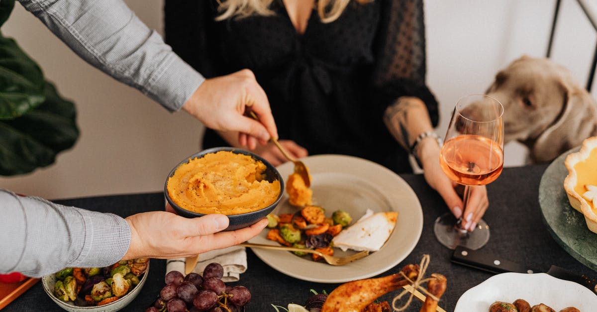 Peking Duck Sauce - Woman in Black Long Sleeve Shirt Holding Clear Drinking Glass Peking Duck Sauce - Woman in Black Long Sleeve Shirt Holding Clear Drinking Glass