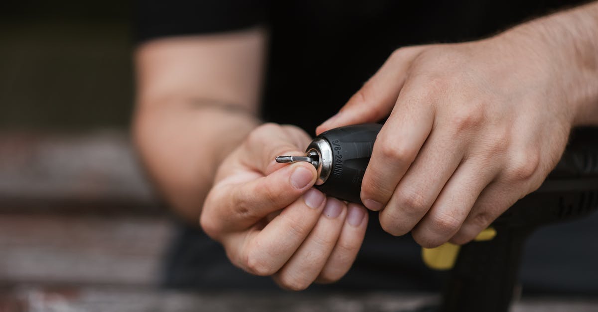 Pemmican -- how was it prepared without metal tools? - Faceless technician preparing electric drill for job Pemmican -- how was it prepared without metal tools? - Faceless technician preparing electric drill for job