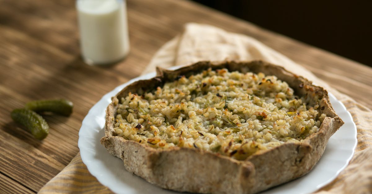 Pie VS Tart VS Quiche - Quiche on White Ceramic Plate Pie VS Tart VS Quiche - Quiche on White Ceramic Plate