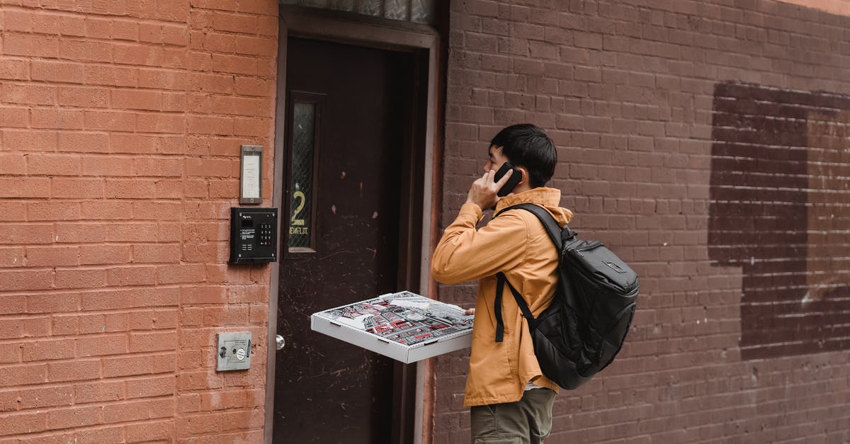 Pizza without yeast - Man Standing Beside a Door Pizza without yeast - Man Standing Beside a Door