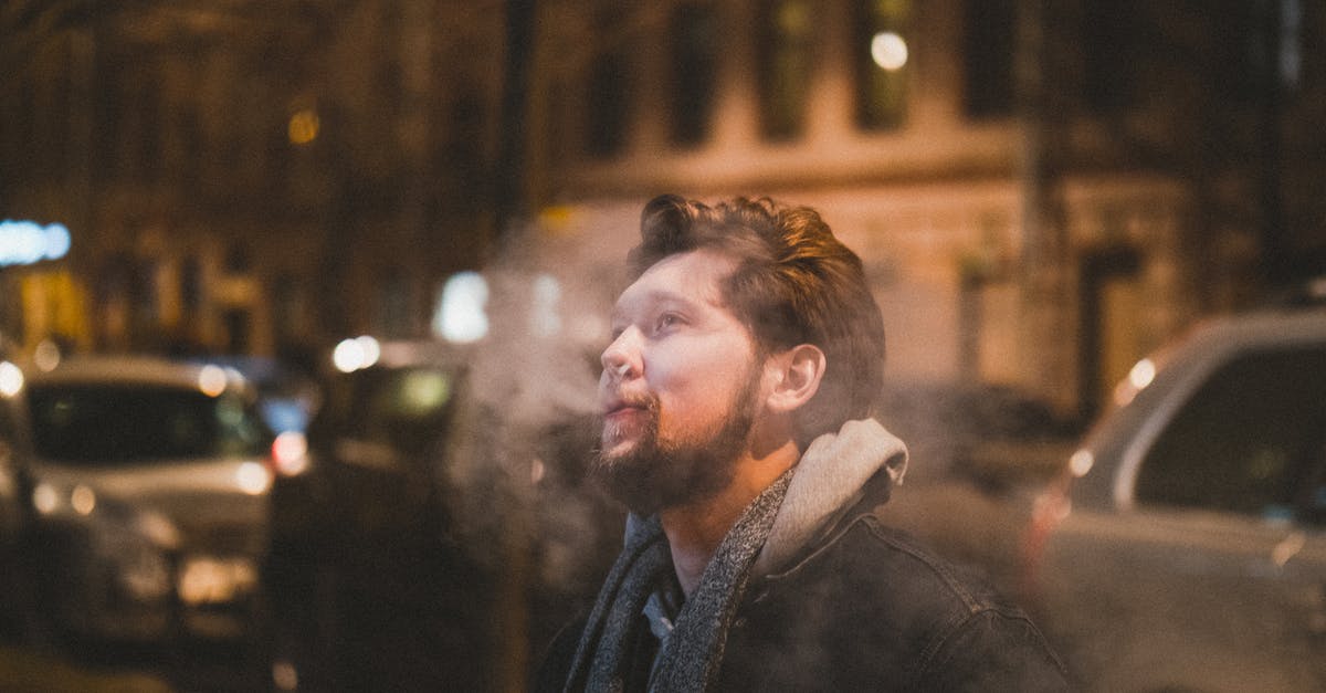 Polymer fume fever probably detected - Man in Black Jacket Standing Near Building during Night Time Polymer fume fever probably detected - Man in Black Jacket Standing Near Building during Night Time