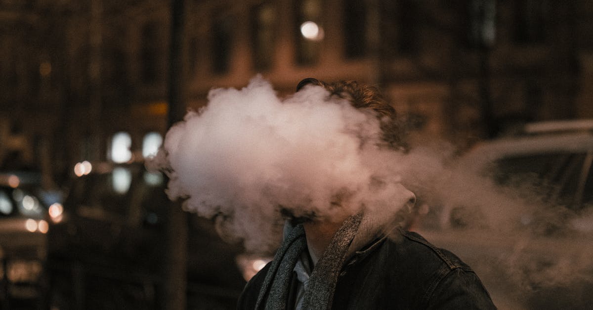 Polymer fume fever probably detected - Man in Black Jacket Smoking Polymer fume fever probably detected - Man in Black Jacket Smoking