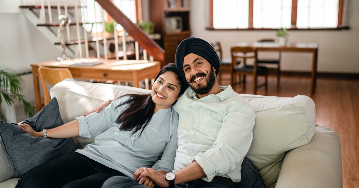 pork went over internal temperature, can I make it tender by putting the oven in a lower temperature for a couple of hours? - Happy ethnic couple embracing on sofa at home pork went over internal temperature, can I make it tender by putting the oven in a lower temperature for a couple of hours? - Happy ethnic couple embracing on sofa at home
