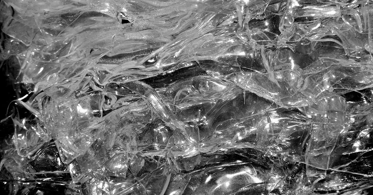 Possible to freeze jam in glass? - From above of transparent clear shiny crystal plastic shapeless texture for abstract background Possible to freeze jam in glass? - From above of transparent clear shiny crystal plastic shapeless texture for abstract background