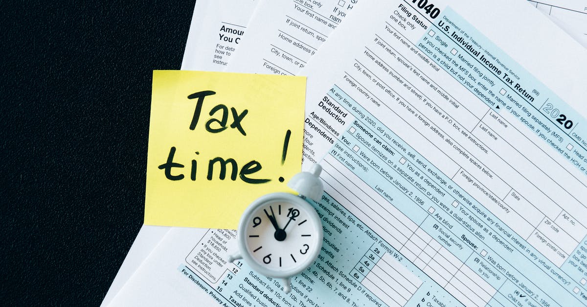 Post-marinade (Seasoning?) - Tax Documents on Black Table Post-marinade (Seasoning?) - Tax Documents on Black Table