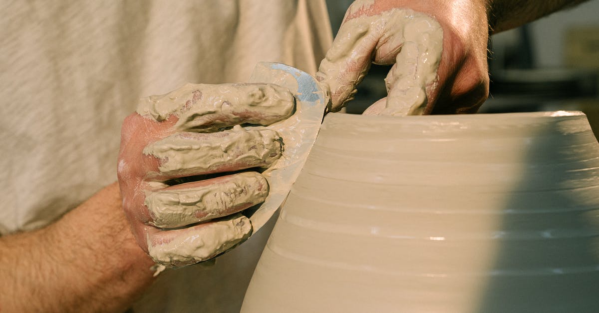 Pot making popping noises - Close-Up Shot of a Person Molding a Clay Pot Pot making popping noises - Close-Up Shot of a Person Molding a Clay Pot