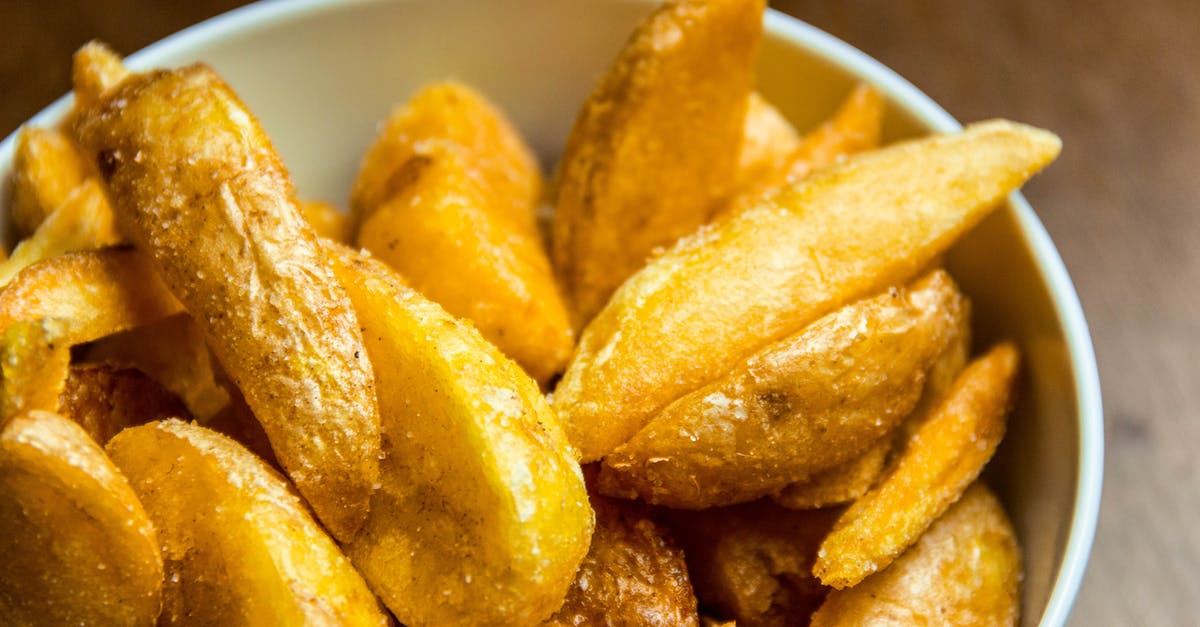 Potato Crisp making - Close Up Photo of Potato Wedges Potato Crisp making - Close Up Photo of Potato Wedges