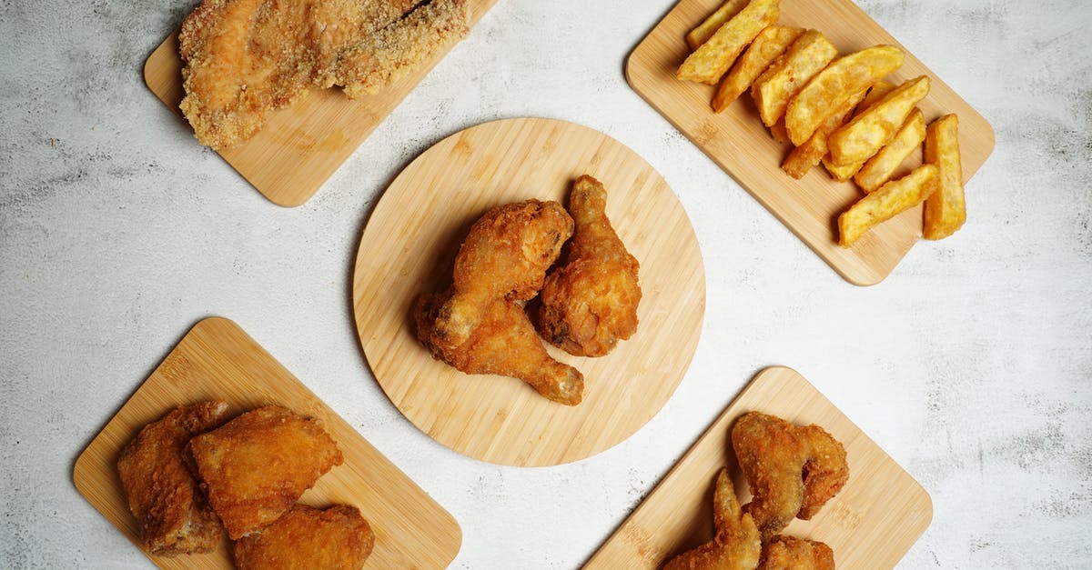 Pre-blending Potatoes - Wooden Trays with Fried Chicken and Potatoes Pre-blending Potatoes - Wooden Trays with Fried Chicken and Potatoes