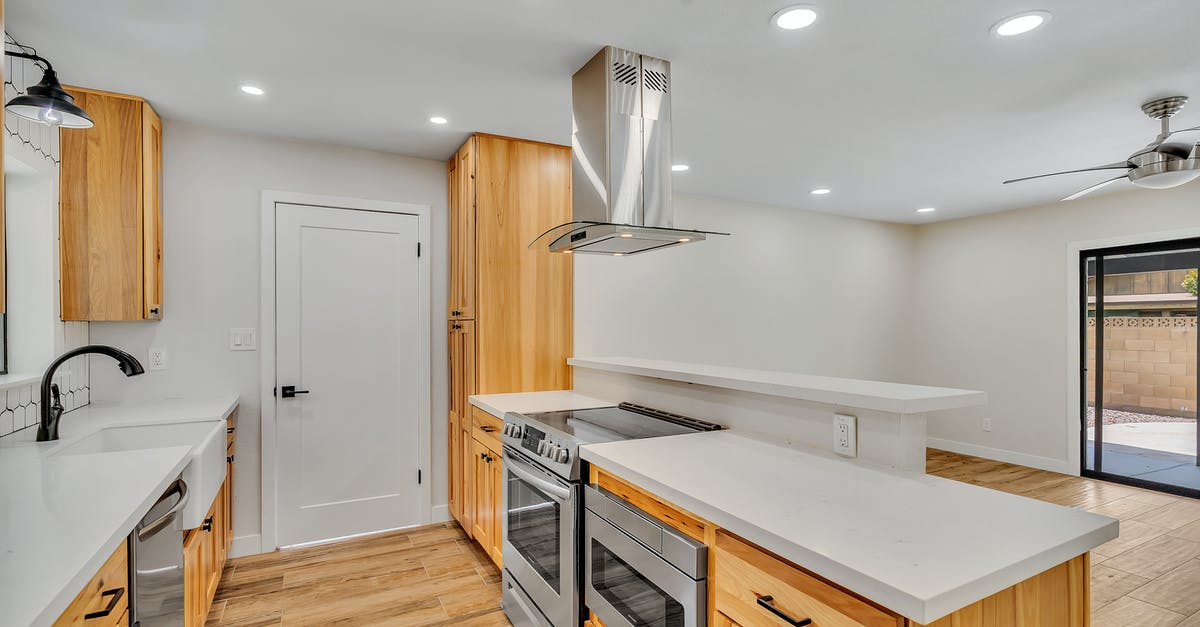 Preheating oven increases temperature? - White and Brown Wooden Kitchen Cabinet Preheating oven increases temperature? - White and Brown Wooden Kitchen Cabinet