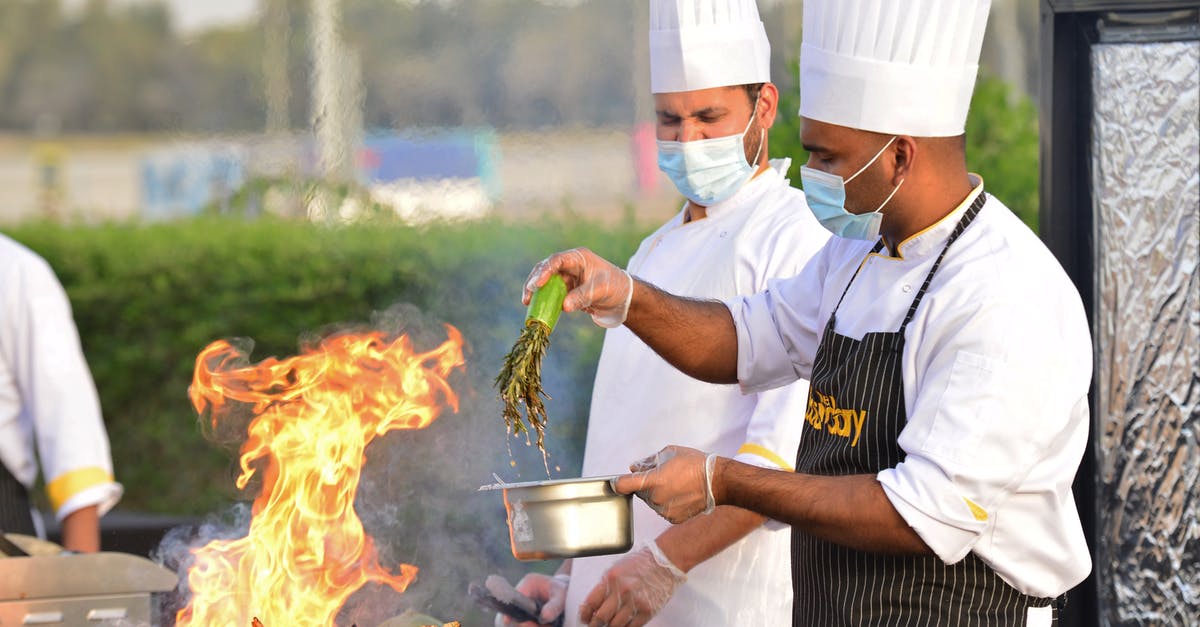 Preparations for outdoor grilling - Chefs Cooking at the Grill Preparations for outdoor grilling - Chefs Cooking at the Grill