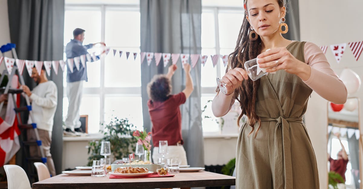 Preparing curries faster - Woman with Dreadlocks Wiping a Wine Glass Preparing curries faster - Woman with Dreadlocks Wiping a Wine Glass