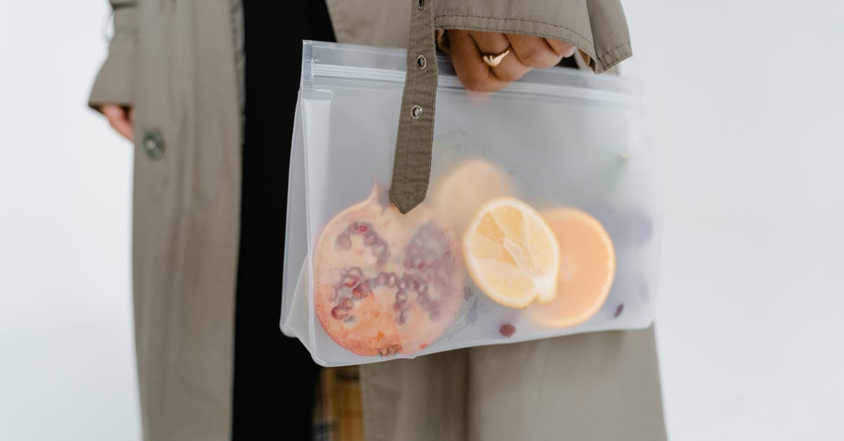 Preserving dehydrated fruits and vegs - A Person Holding Fruits in a Zip Lock Bag
Preserving dehydrated fruits and vegs - A Person Holding Fruits in a Zip Lock Bag