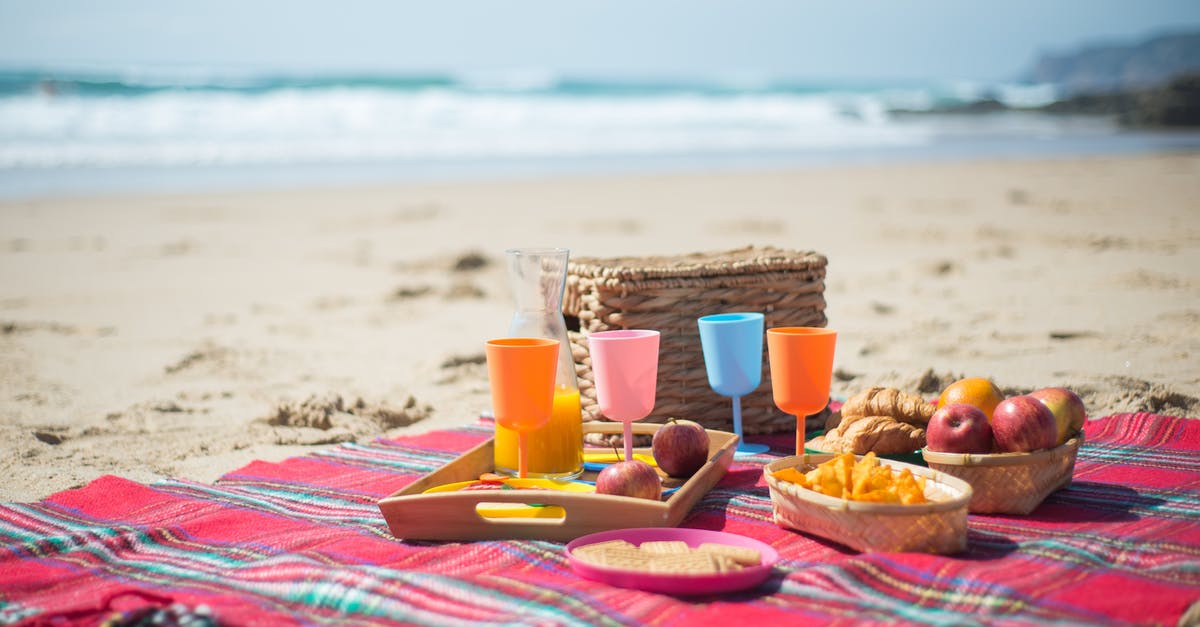 Preserving dehydrated fruits and vegs - Bread and Bread on Pink and Blue Towel on Beach Preserving dehydrated fruits and vegs - Bread and Bread on Pink and Blue Towel on Beach