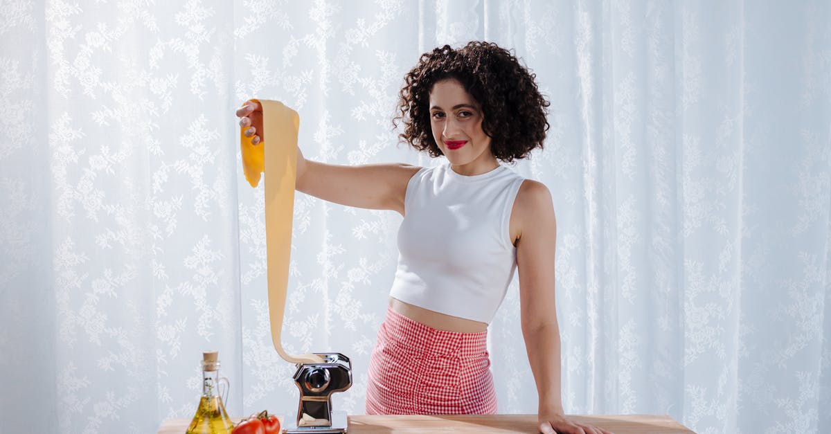 Pressure canning tomato paste - Woman in Room with Pasta Maker Pressure canning tomato paste - Woman in Room with Pasta Maker