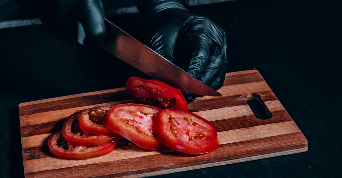 Pressure canning tomato paste - Red Bell Pepper on Brown Wooden Chopping Board Pressure canning tomato paste - Red Bell Pepper on Brown Wooden Chopping Board