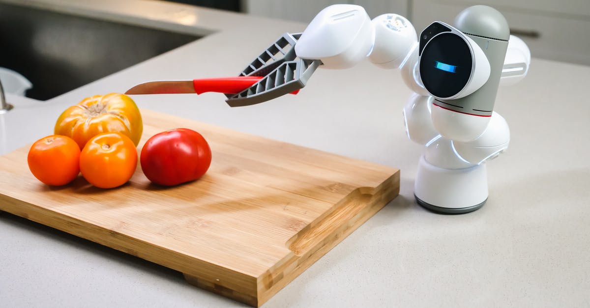 Pressure canning tomatoes without added acid - White and Black Robot Toy on Brown Wooden Chopping Board