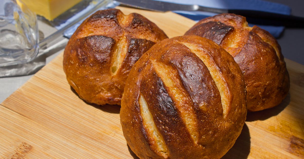 Prevent brioche buns from spreading during rise - Close-Up Photo of Three Brown Brioche Buns Prevent brioche buns from spreading during rise - Close-Up Photo of Three Brown Brioche Buns