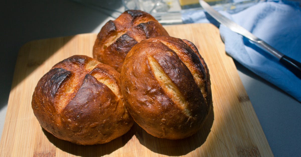 Prevent brioche buns from spreading during rise - Brown Bread on Wooden Board Prevent brioche buns from spreading during rise - Brown Bread on Wooden Board