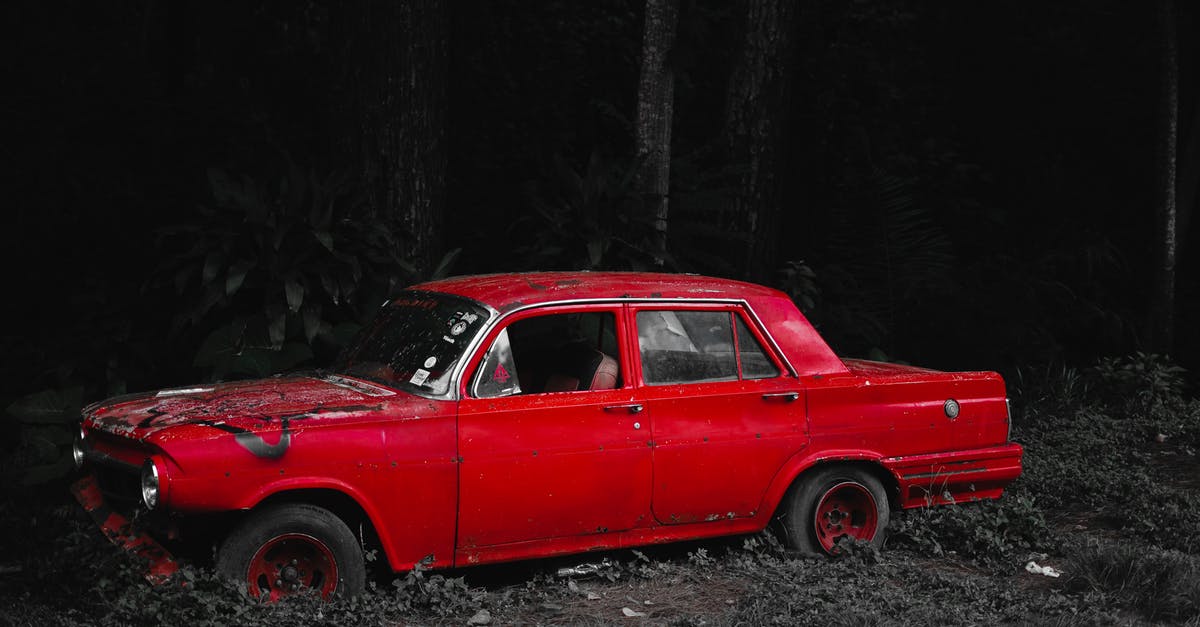 Problem Rolling Out Rough Puff Pastry - Old car with damaged bumper and broken window on grassy ground in forest Problem Rolling Out Rough Puff Pastry - Old car with damaged bumper and broken window on grassy ground in forest