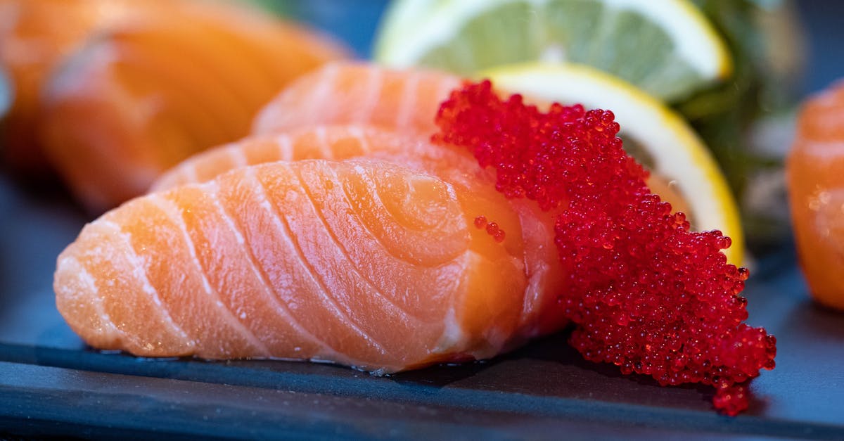 Process fresh salmon into Sushi / Sashimi salmon? - Close-Up Photo of Sliced Salmon Process fresh salmon into Sushi / Sashimi salmon? - Close-Up Photo of Sliced Salmon