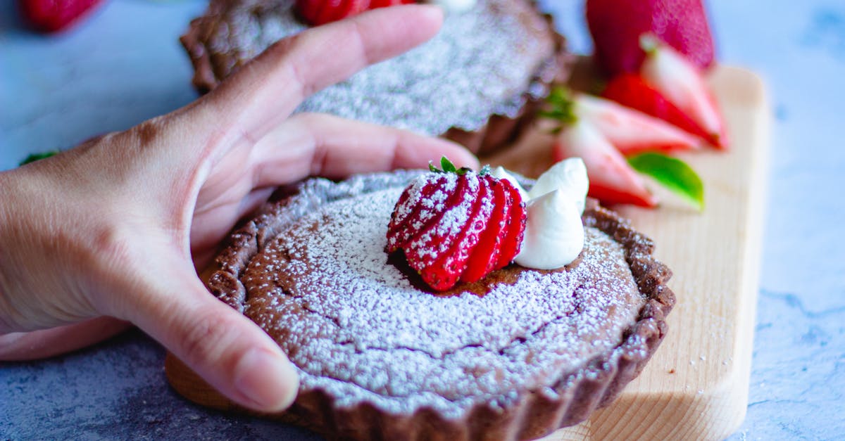 Puff pastry chocolate tart? - A Person Holding a Tart Puff pastry chocolate tart? - A Person Holding a Tart