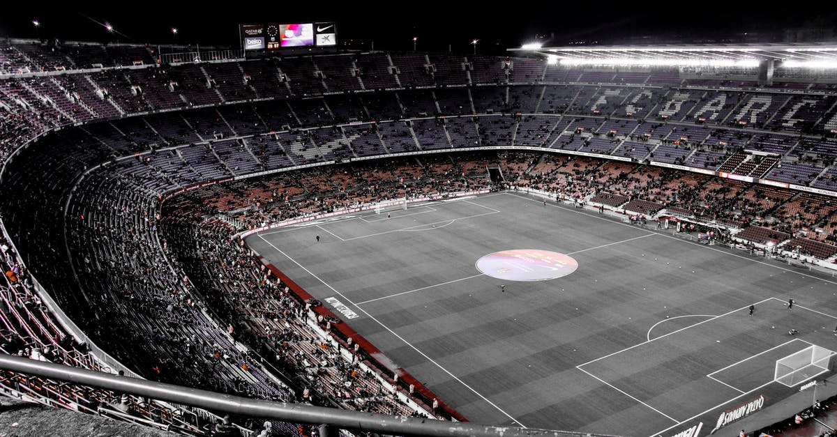 Pulled Pork for a large crowd - Modern football stadium with spectators on tribunes