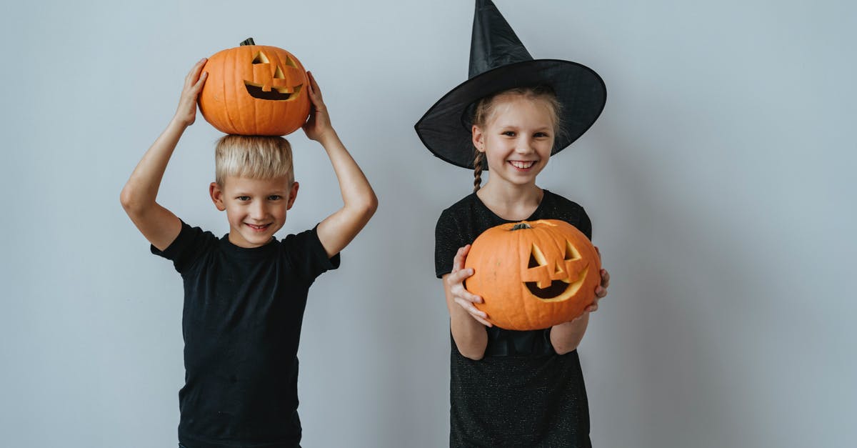 Pumpkin mousse looks grainy and slightly watery - Boy and Girl Holding Jack O Lantern Pumpkin mousse looks grainy and slightly watery - Boy and Girl Holding Jack O Lantern