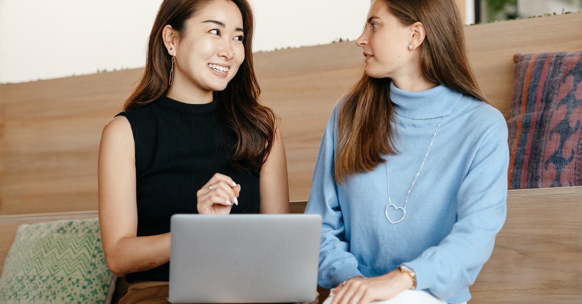 Quantity of Orzo when using other ingredients - Content cheerful diverse women talking and using laptop Quantity of Orzo when using other ingredients - Content cheerful diverse women talking and using laptop