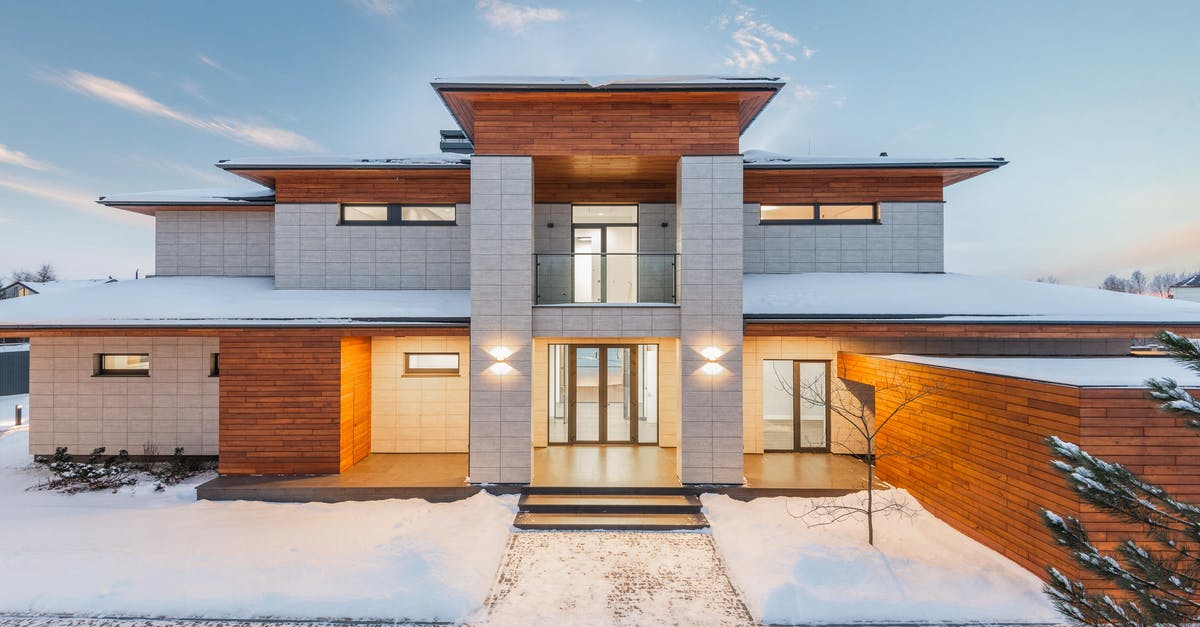Question about new sourdough starter, specifically smell - Backyard view of new modern luxurious cottage house with stone and wooden facade and illumination in winter countryside Question about new sourdough starter, specifically smell - Backyard view of new modern luxurious cottage house with stone and wooden facade and illumination in winter countryside