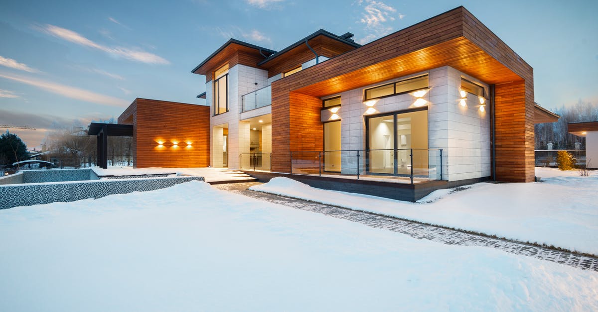 Question about new sourdough starter, specifically smell - Exterior architecture of private suburban cottage house with stone and wooden facade and large windows overlooking spacious snow covered yard in winter day Question about new sourdough starter, specifically smell - Exterior architecture of private suburban cottage house with stone and wooden facade and large windows overlooking spacious snow covered yard in winter day
