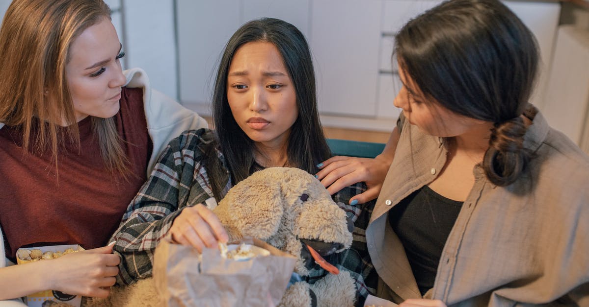 Quick flavour for fresh popcorn - Woman in Black Jacket Holding Brown Bear Plush Toy Quick flavour for fresh popcorn - Woman in Black Jacket Holding Brown Bear Plush Toy