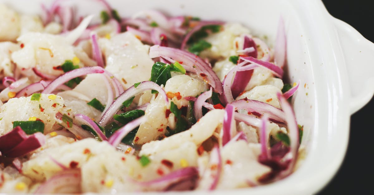 "Cooking" with acid (ceviche) - Sliced Vegetables in White Ceramic Bowl "Cooking" with acid (ceviche) - Sliced Vegetables in White Ceramic Bowl