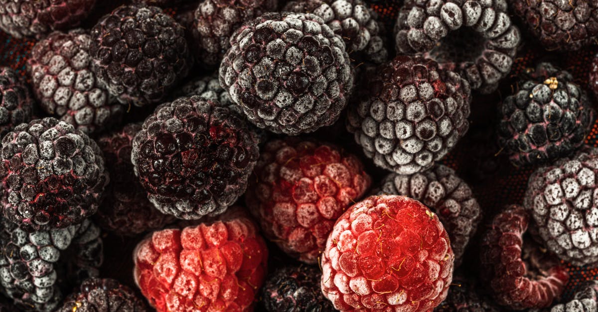 Raspberries too wet in muffin - Frozen Raspberries in Close-up Photography Raspberries too wet in muffin - Frozen Raspberries in Close-up Photography