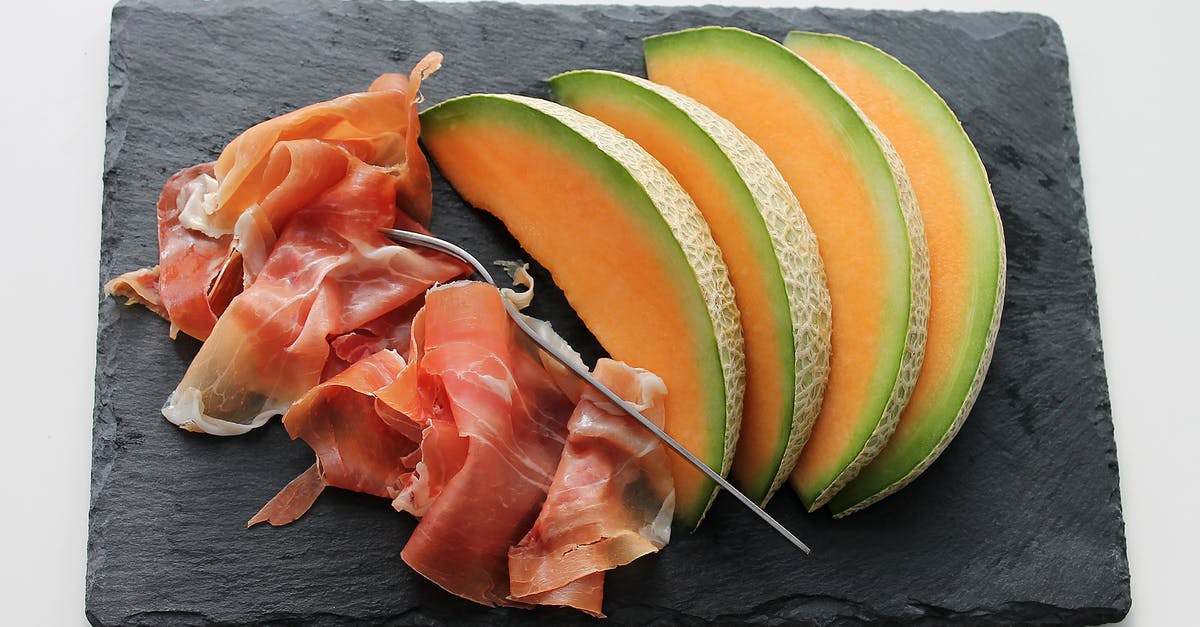Raw Ham Roast...How to smoke - Melon on Black Tray Raw Ham Roast...How to smoke - Melon on Black Tray