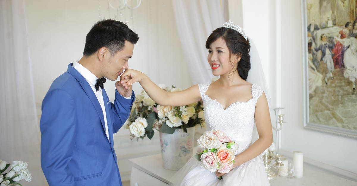 re: reboiling ghee - Man in Blue Suit Jacket Kissing Woman in White Wedding Dress re: reboiling ghee - Man in Blue Suit Jacket Kissing Woman in White Wedding Dress