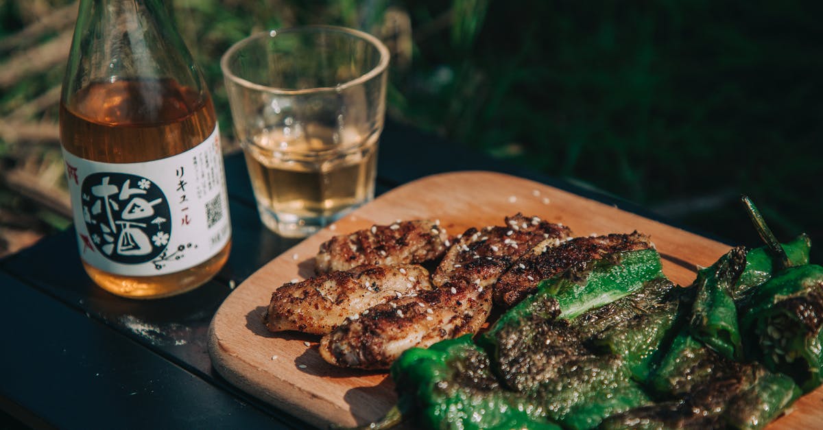 Really pink Chinese BBQ Pork (Char Siu): Safe to eat? - Grilled Meat on Brown Wooden Plate Beside Clear Drinking Glass Really pink Chinese BBQ Pork (Char Siu): Safe to eat? - Grilled Meat on Brown Wooden Plate Beside Clear Drinking Glass