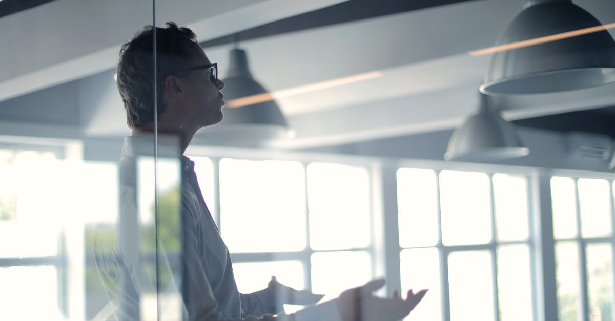 Recommendations for spice organization strategies - Male employer gesticulating and explaining idea in light office Recommendations for spice organization strategies - Male employer gesticulating and explaining idea in light office