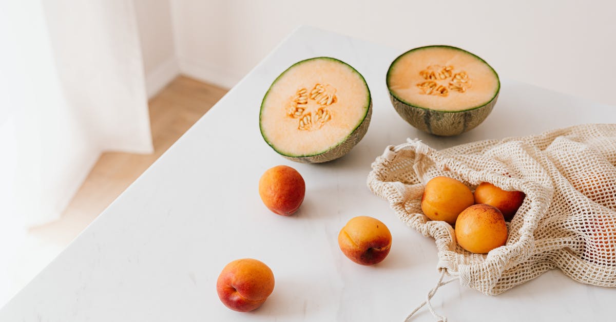 Reduce Sweetness in Fudge - Jute sack with ripe apricots on table near halved appetizing melon Reduce Sweetness in Fudge - Jute sack with ripe apricots on table near halved appetizing melon