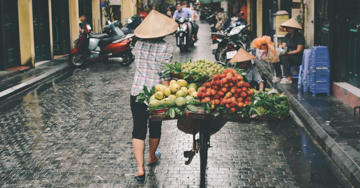 Refreezing stock after boiling - Person Walking on Market Refreezing stock after boiling - Person Walking on Market