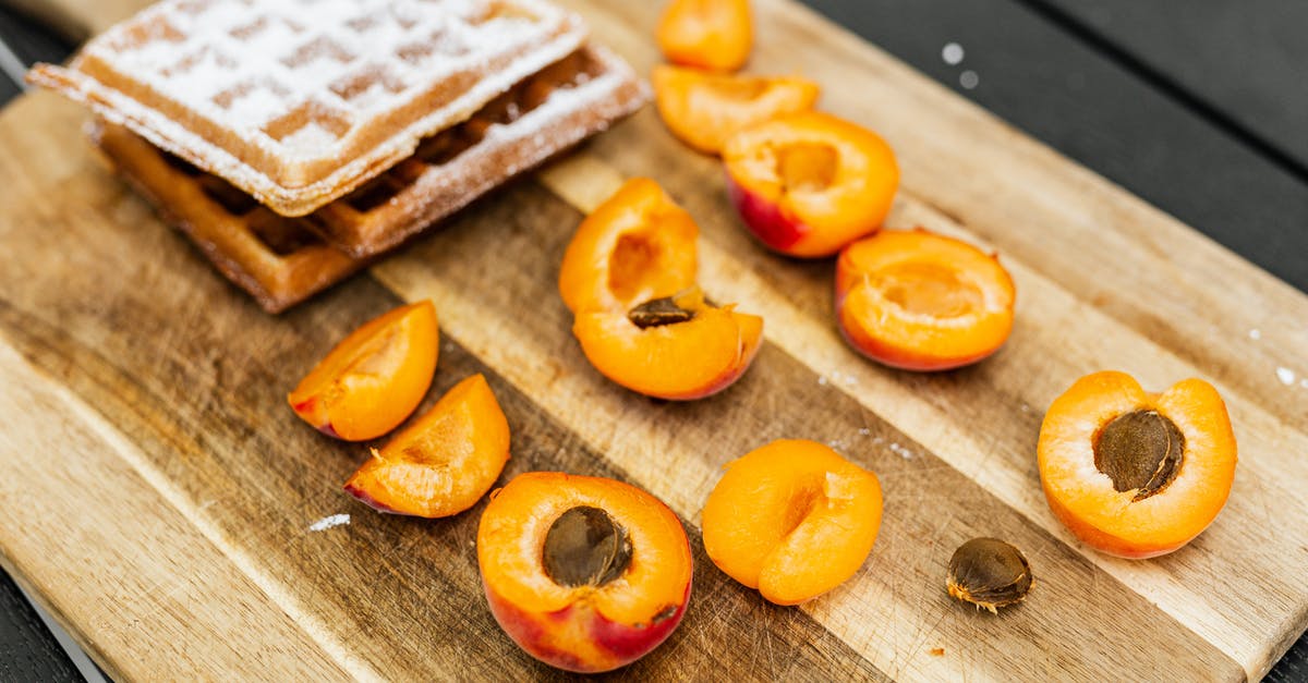 refrigerating cooked waffles - Sliced Orange Fruit on Brown Wooden Chopping Board refrigerating cooked waffles - Sliced Orange Fruit on Brown Wooden Chopping Board