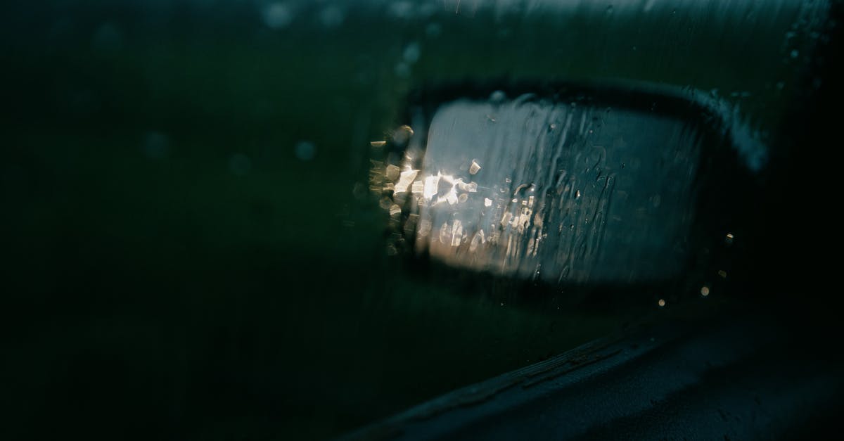 Refrigerator drips water inside - Through window of car on mirror Refrigerator drips water inside - Through window of car on mirror